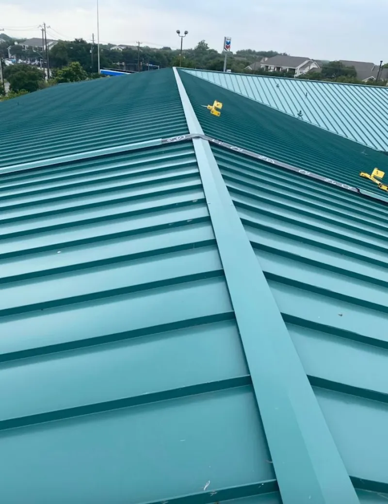Green commercial metal roof ridge and valley for Metal Roof Repair in Maryland Heights
